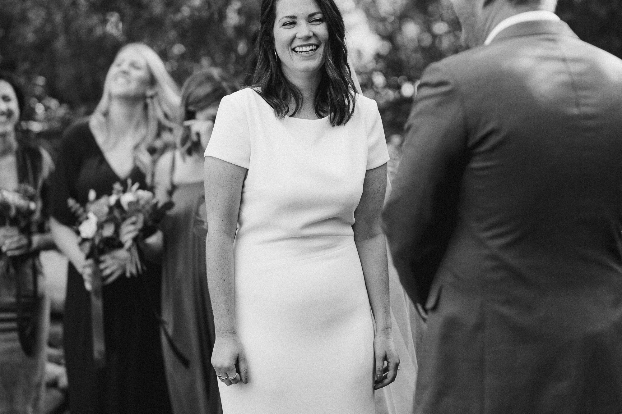 Bride Laughing at Ceremony.