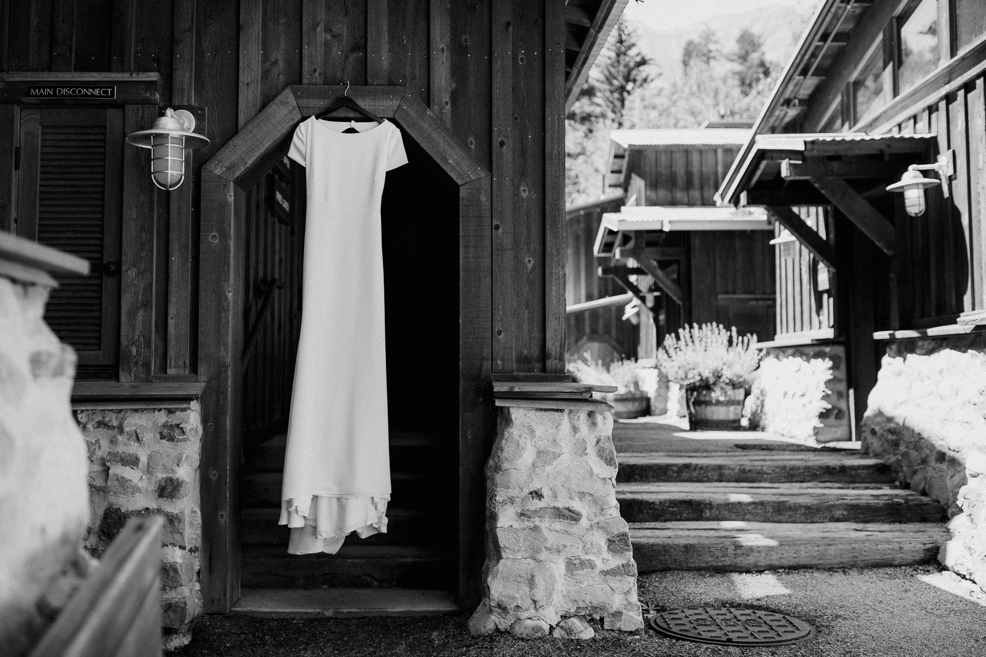 Wedding Dress Hanging in Hallway.