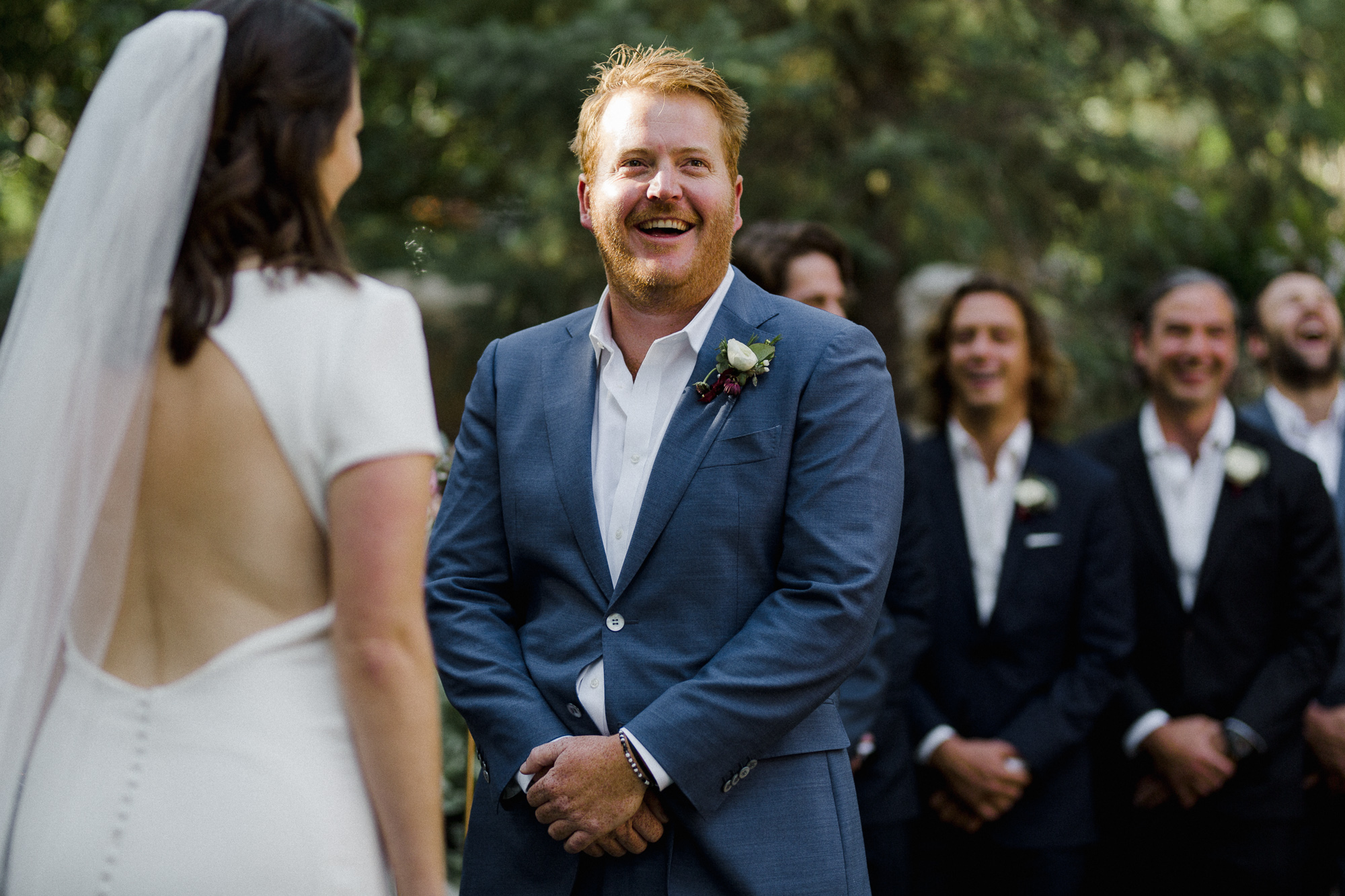 Groom Smiling at Ceremony.