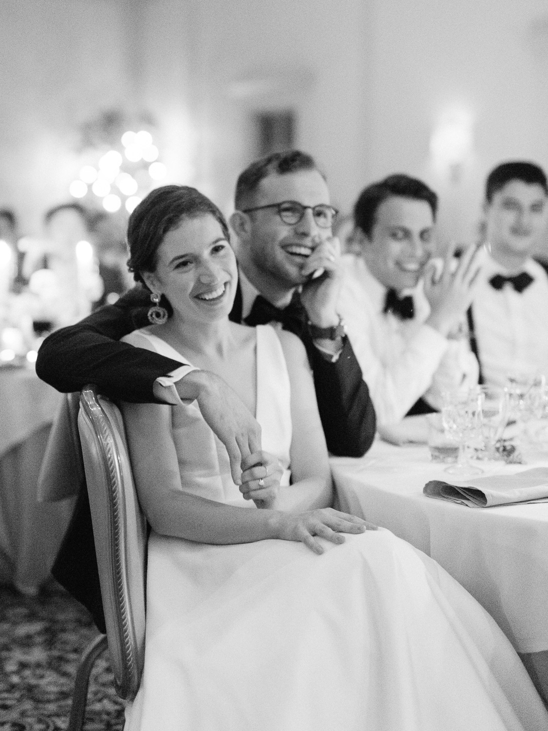 bride-and-groom-laughing-at-dinner