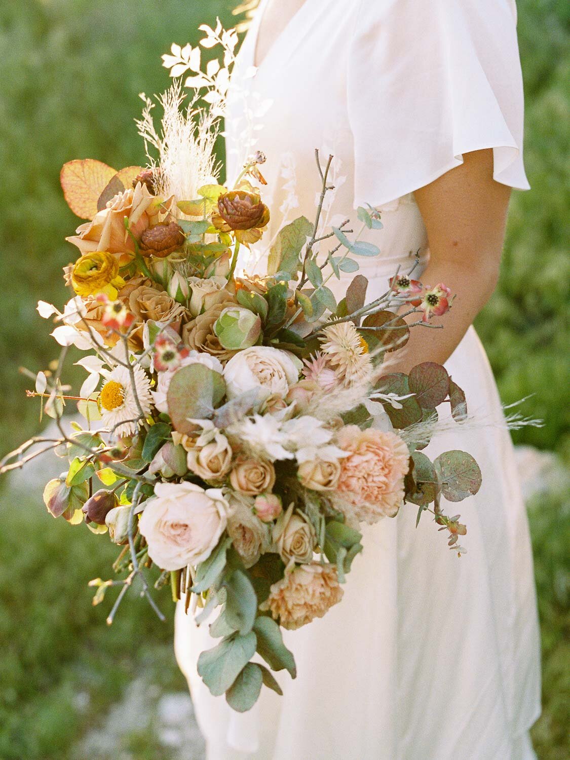 bride-holding-flower-bouquet
