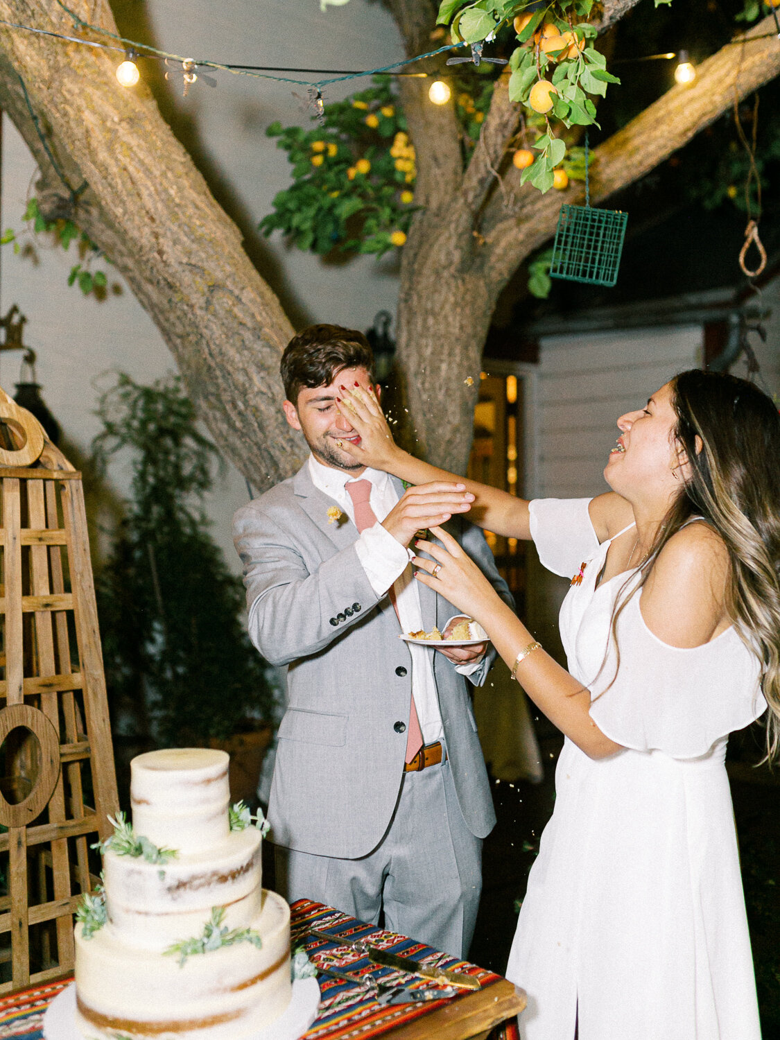 bride-smashing-cake-on-groom