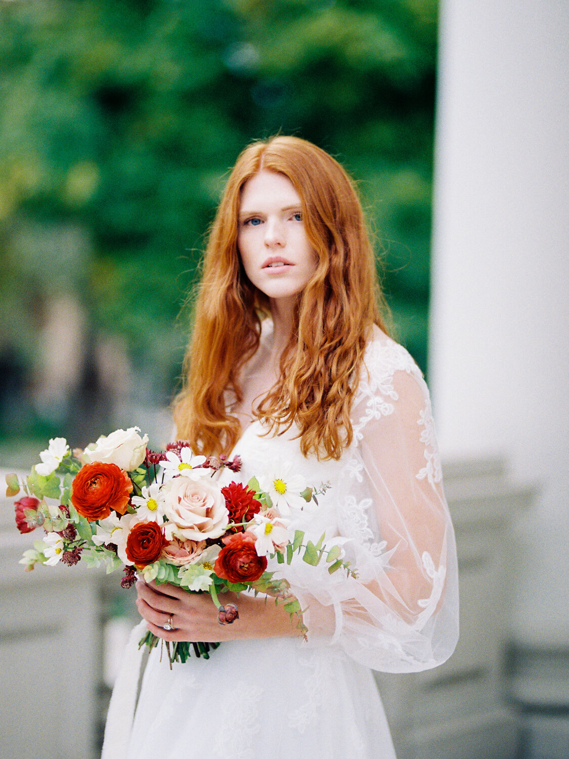 bride holding flowers