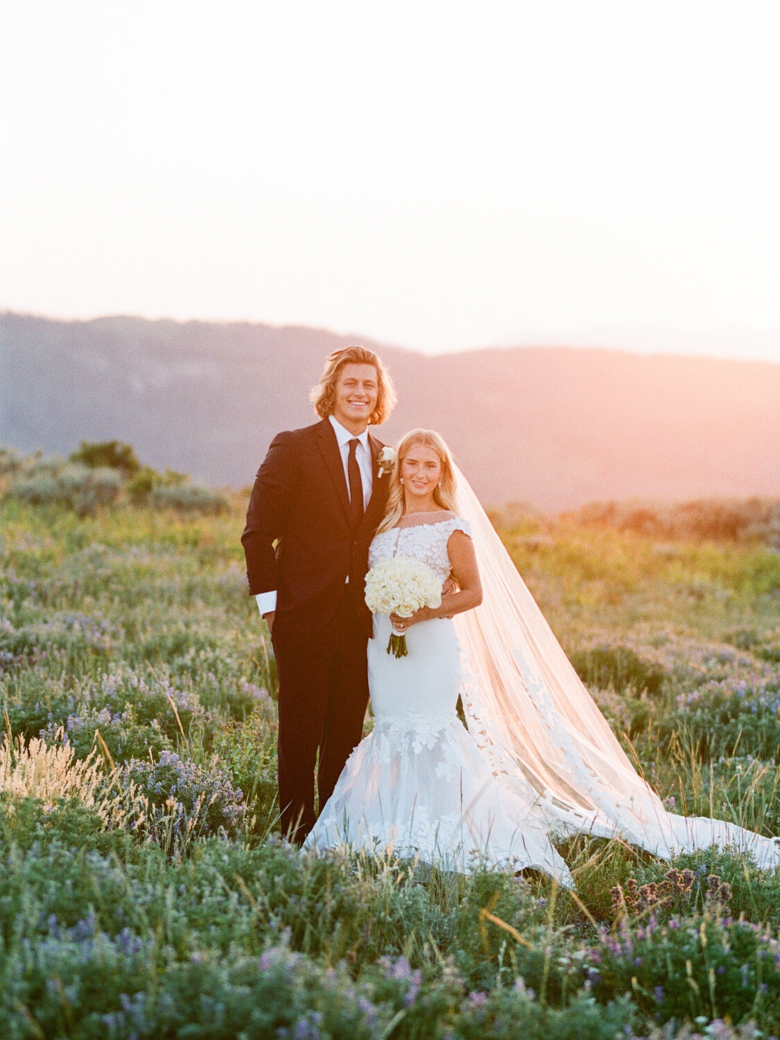 bride and groom portrait at sunset in mountains