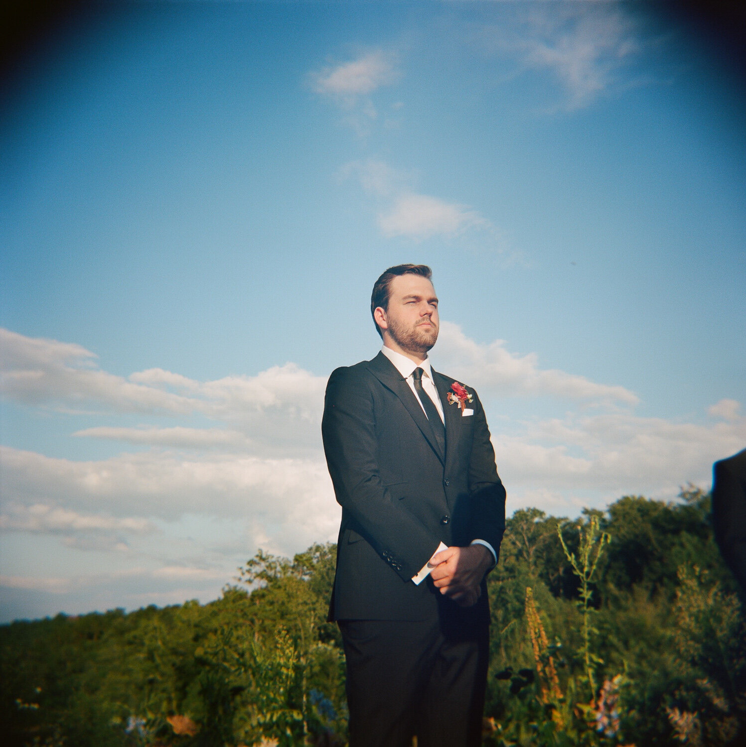 groom waiting to see bride at alter